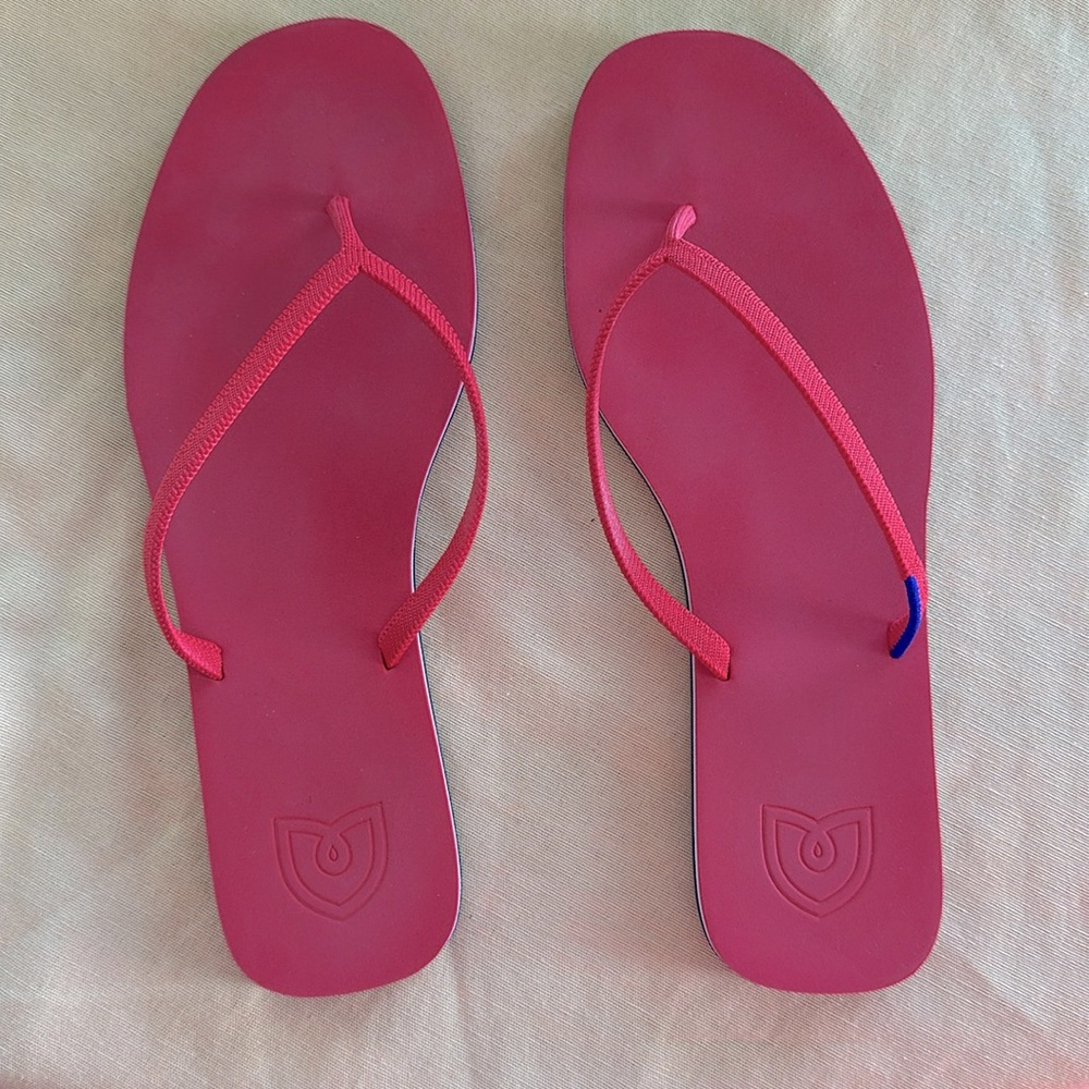 Rothy’s Firecracker Red Flip Flop Sandals with red white and blue accents